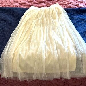 Adorable, whimsical cream skirt